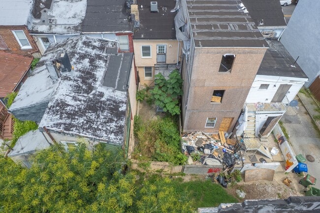 Building Photo - Spacious 2BR/2.5BA Townhome with Finished Basement & Extra Storage