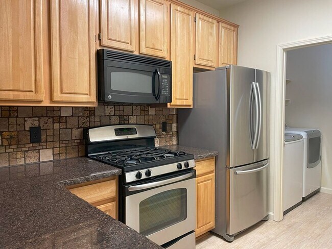 Building Photo - South Reno Tanamera Two Bedroom Upstairs Condo