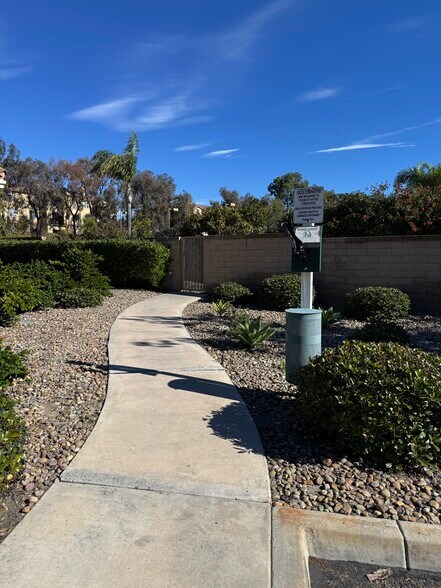 Gate to walking path. - 12525 Ruette Alliante