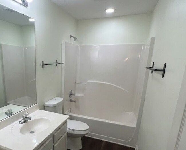 Building Photo - End Unit Townhome - Included in the RENT Water, Trash and Lawncare!