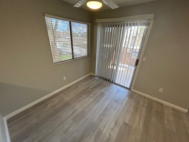 Building Photo - INVITING 2 BEDROOM TOP FLOOR CONDO IN A CE...