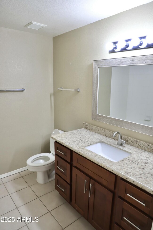 Building Photo - 9555 E Raintree Dr