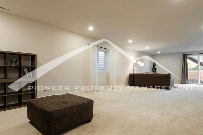 Building Photo - Stylish Main-Level Living with Finished Ba...