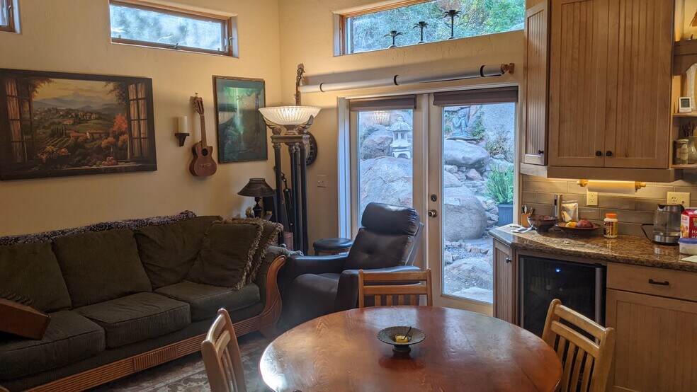 Great room with French doors and clerestory windows - 13915 Mussey Grade Rd