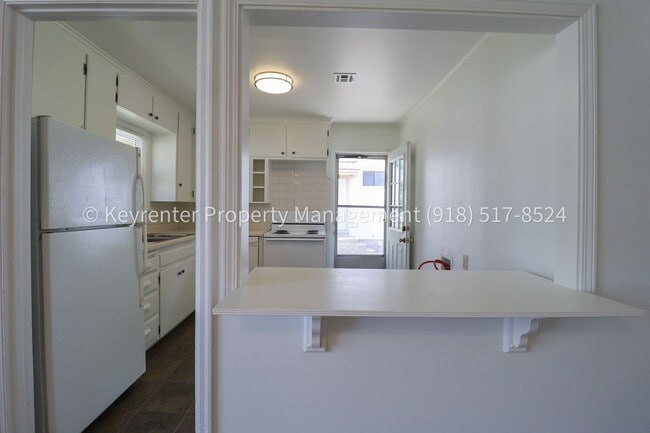 Building Photo - Gorgeous duplex unit on large lot with garage -- NO PETS ALLOWED