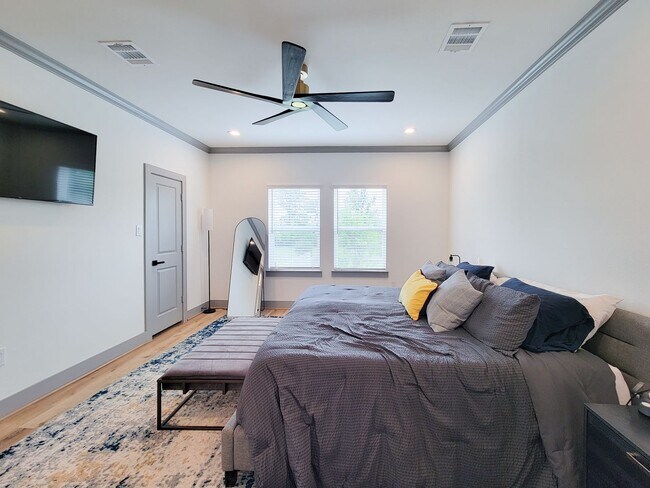 Building Photo - This 4-bedroom, 3-bathroom, two-story residence comes with a generous two-car attached garage. Re...