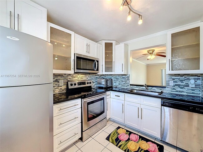 Building Photo - 8740 N Sherman Cir