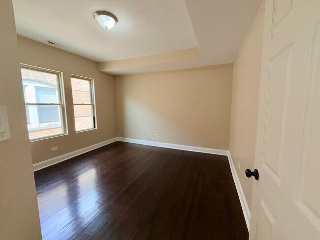 Building Photo - 7208 S Cornell Ave