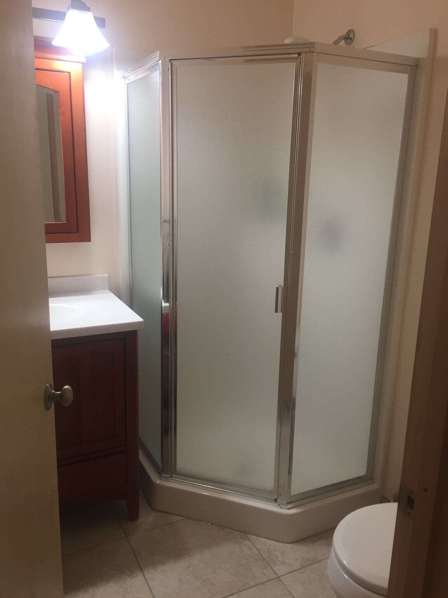 Vanity and shower - 108 Wilderness Dr