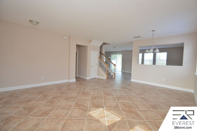 Building Photo - SPACIOUS, FULLY FENCED 4/2.5/2 IN DESIRABLE MATANZAS WOODS
