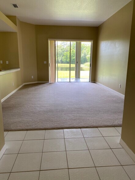 Living room with pond view - 1147 Big Creek Drive