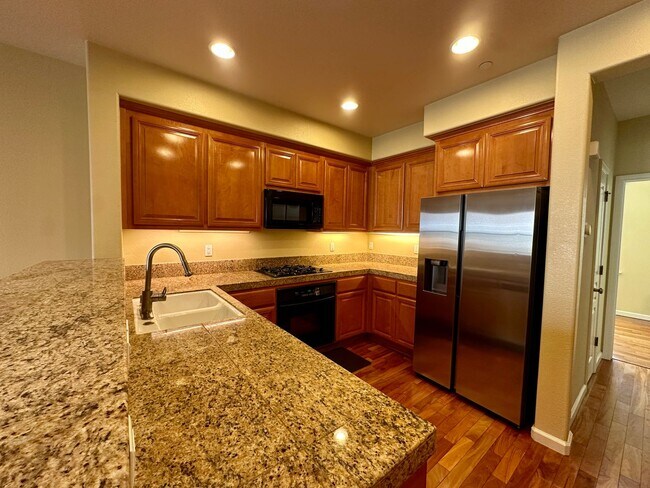 Building Photo - TOWNHOME WITH THOUGHTFUL UPGRADES | CALM SETTING