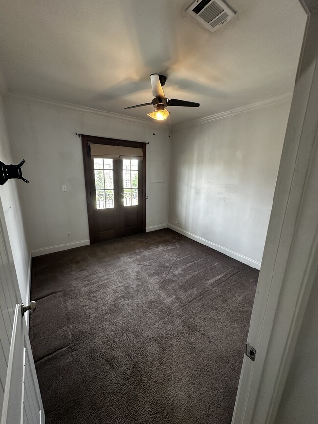 Guest Bedroom #2 with balcony entrance - 513 Cliff Bullock Dr