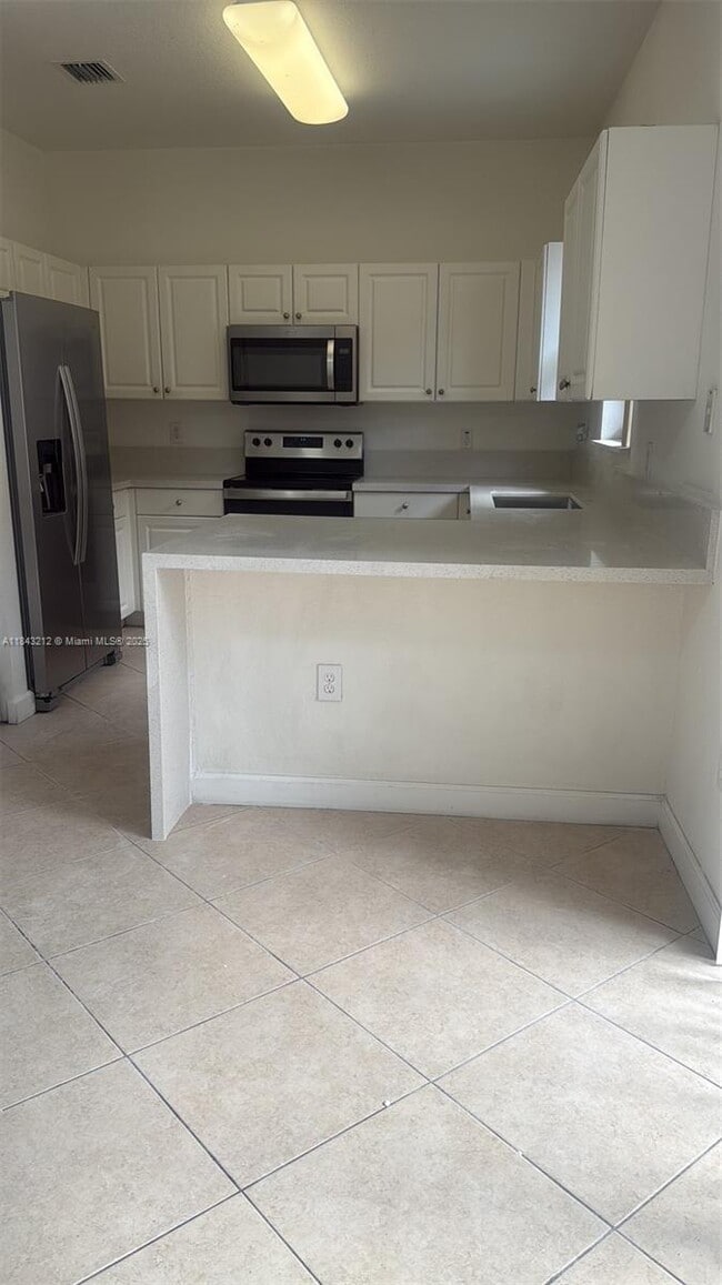 Building Photo - 13242 SW 127th Ct