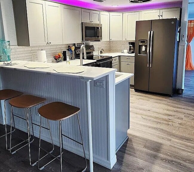 Building Photo - "Charming 4-Bed, 3-Bath Waterfront Home in Weeki Wachee Gardens"