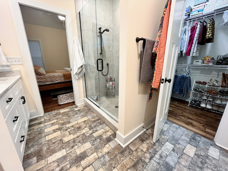 Primary bathroom with view of closet and bedroom - 426 Sheldon Rd