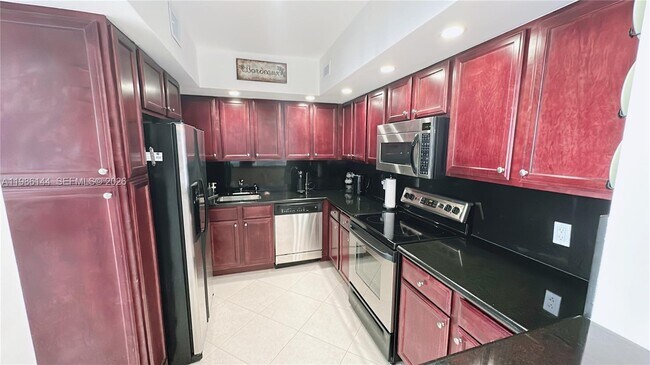 Building Photo - 5600 Collins Ave