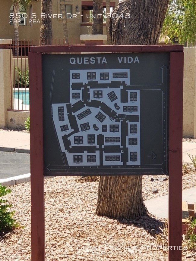 Building Photo - Questa Vida Condo