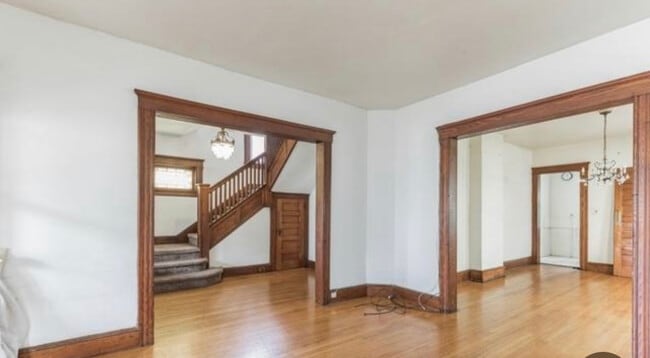 Entry and view of stairs, closet - 499 Highland Ave