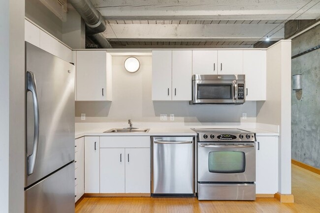 Building Photo - Historic Chown Pella Lofts - east facing studio w/parking/most utilities/rooftop deck