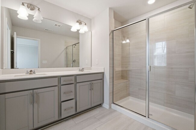 Building Photo - Upgraded 3BR Townhome in Wake Forest | Open Layout, Garage & Resort-Style Amenities