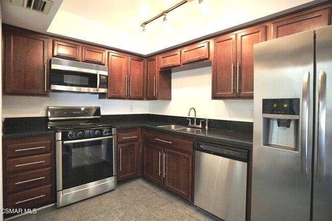 Building Photo - 11738 Moorpark St