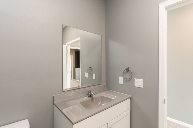 Building Photo - Spacious Townhome with Heated Garage Just ...