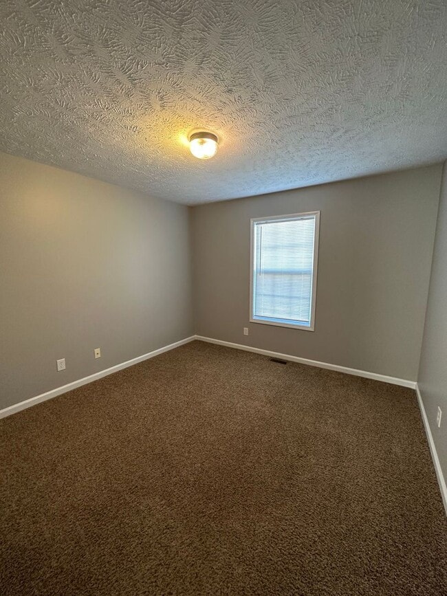 Building Photo - 1009 Bobcat Dr