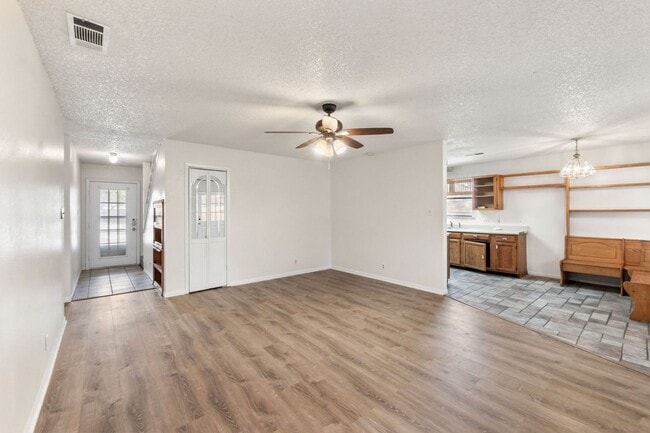 Building Photo - Bright and Inviting 3-Bedroom with Private...