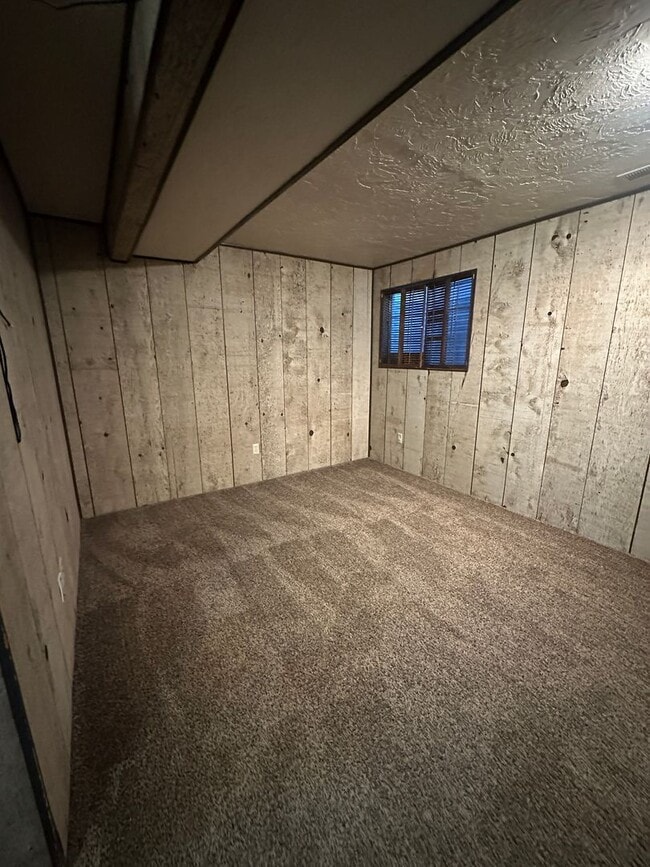 Building Photo - Spacious, three level, 4 Bed 2.5 bath Townhome in Ammon right behind the Walmart on Hitt.