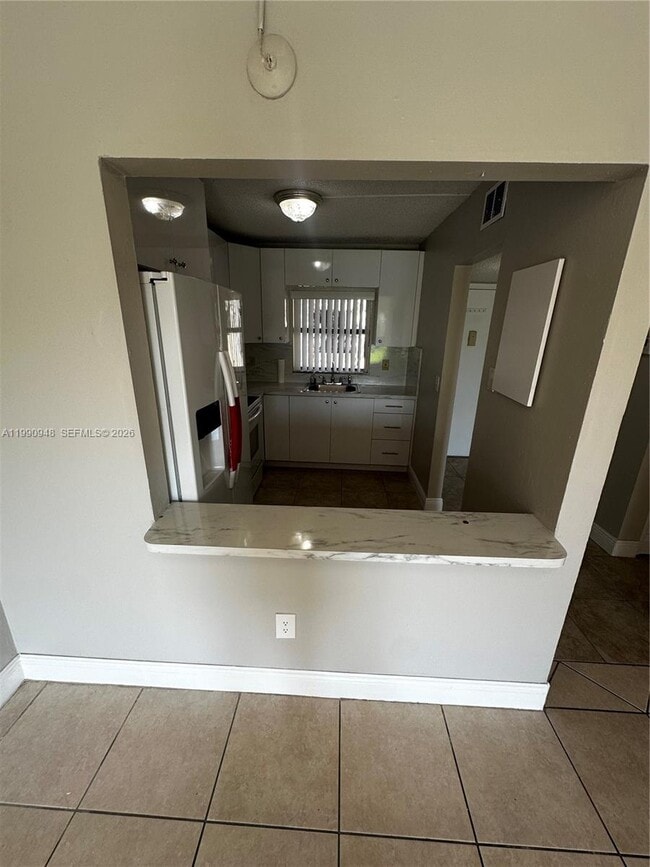 Building Photo - 6565 W 26th Dr