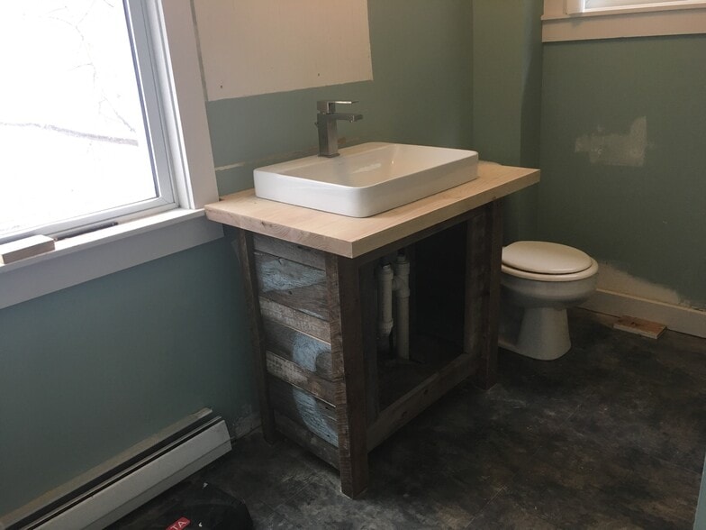 Bathroom features full tub/shower. Another photo that shows the not-quite-finished renovations, but a little more paint and a mirror are going up by January 1. - 12 Boynton Street