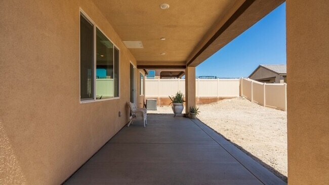 Building Photo - AVAILABLE NOW!! 3 Bedroom 2 Bathroom UNFURNISED Home with Solar Panels in Skyborne in Desert Hot ...