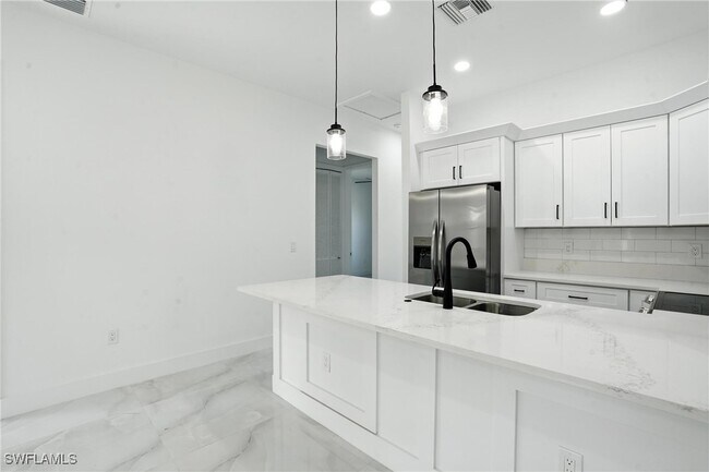Building Photo - 4881-4883 Leonard Blvd S