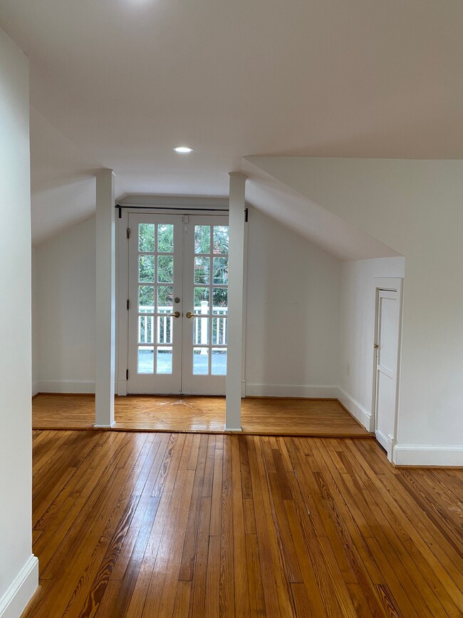 Upper level Bedroom #1. French doors to deck - 4809 Calvert Rd