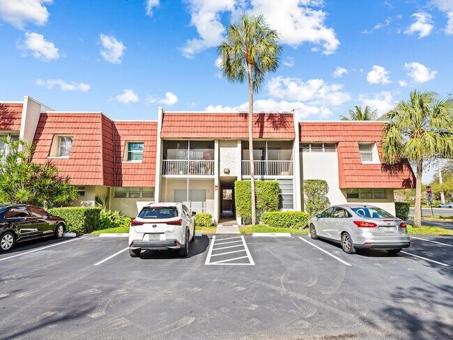 Building Photo - 1 Jacaranda Country Club Dr