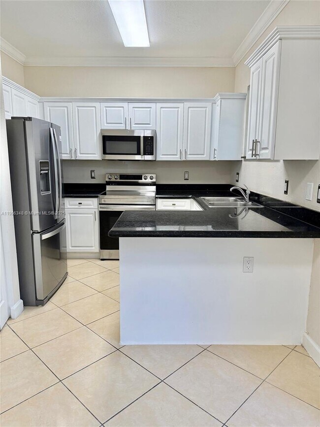 Building Photo - 2665 NE 4th St