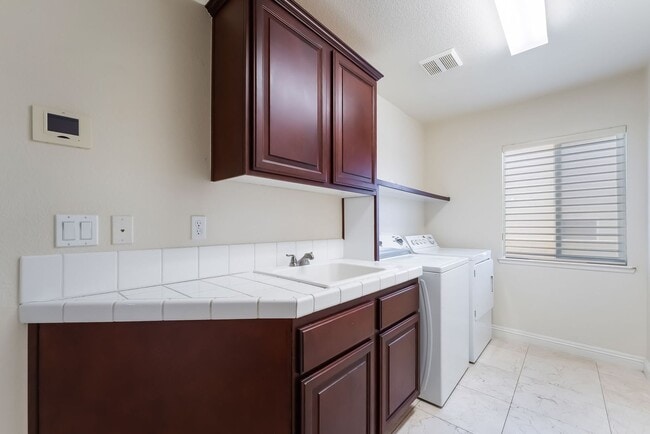 Building Photo - Beautiful Three Story, Five Bedroom Home with Lagoon Style Pool and Spa