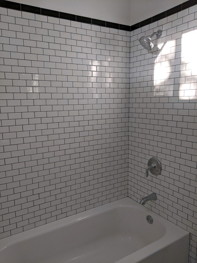 Brand new shower with tile walls! - 2214 Valence St