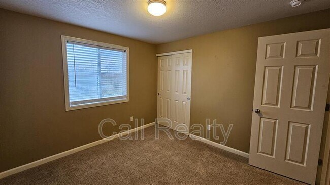 Building Photo - 9302 W Caelen Ave