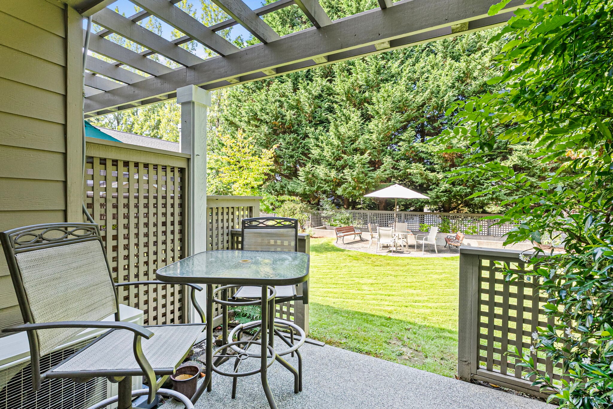 Shaded personal back patio with room for a BBQ - 1220 Weaver Rd NW