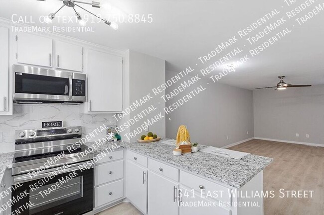 Building Photo - Gorgeous, Newly Renovated Townhome