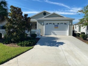 Building Photo - Resort Living in This UNFURNISHED Annual Rental in The Village of Fenny, Patio Villa, 2 bed, 2 bath.