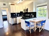 Building Photo - 8819 Harding Ave