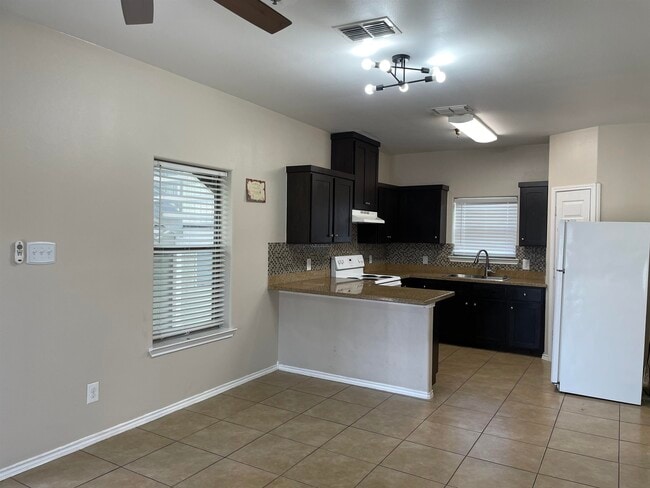Building Photo - 5402 Marcella Ave