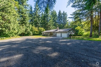 Building Photo - BEAUTIFUL UPDATED RAMBLER WITH LARGE GARGE