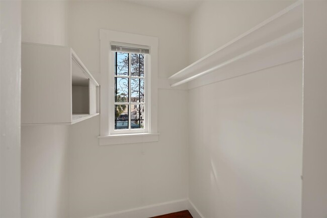 The main bedroom walk in closet with a lot of space. - 2108 E 23rd St