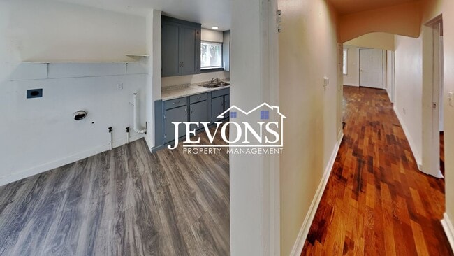 Building Photo - Step into your new residence, a charming s...