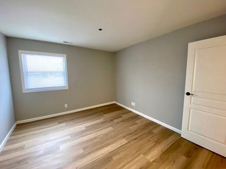 2nd Bedroom with New LVP Flooring - 12765 W Hampton Ave