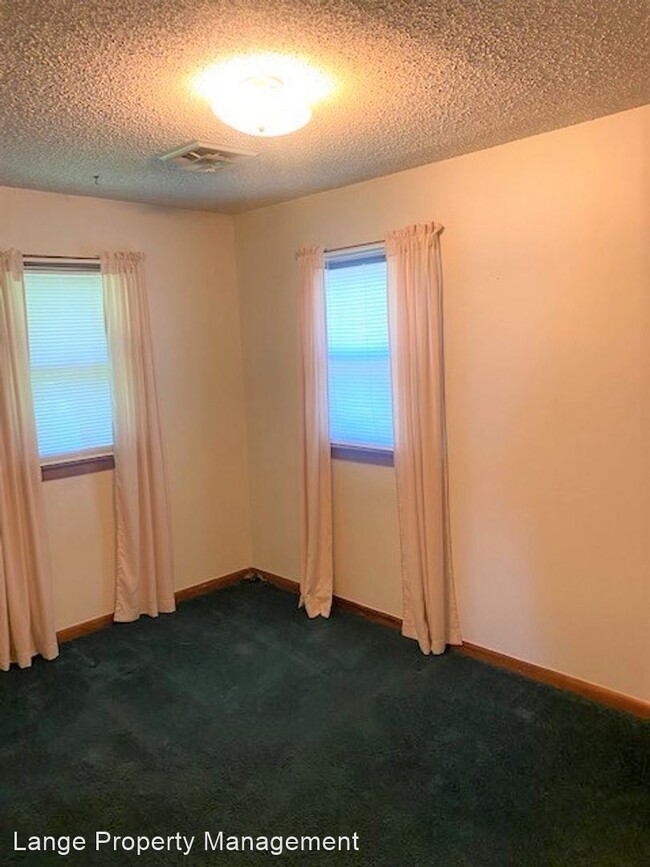 Building Photo - 2 br, 1 bath House - 711 W. Smith